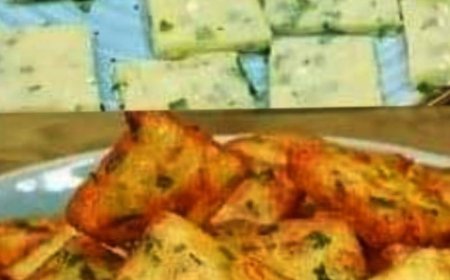 Bring a basket of fried potatoes and mix them with herbs.