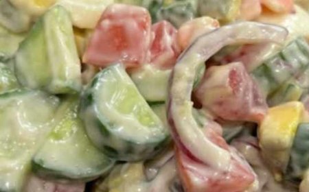 sliced tomatoes and cucumbers marinated in olive oil