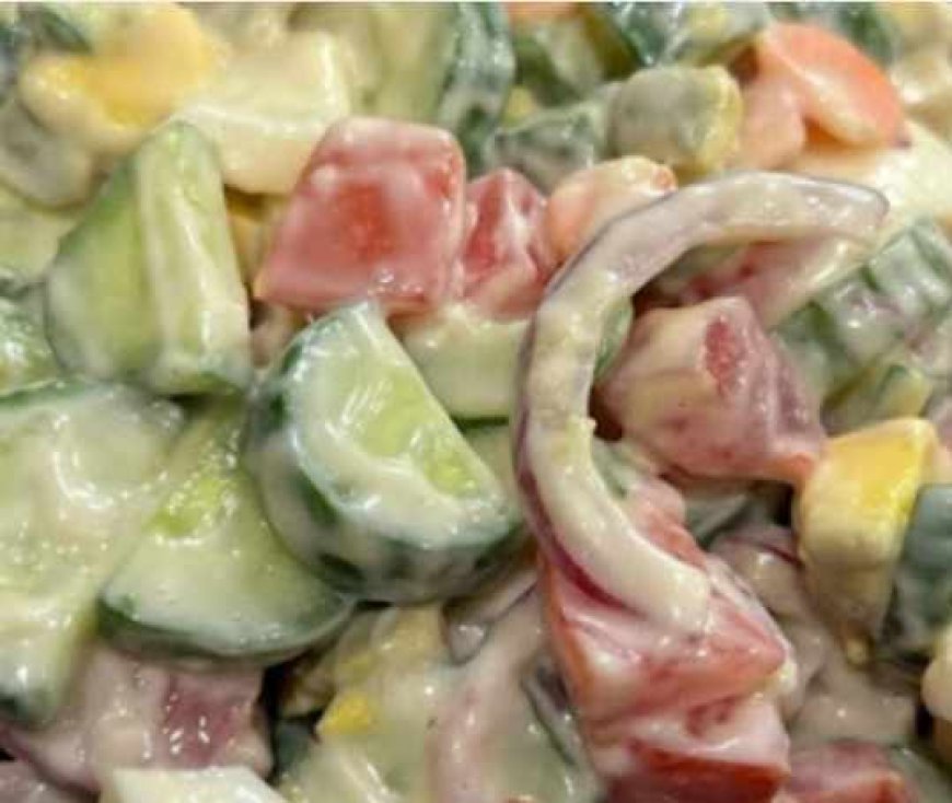 sliced tomatoes and cucumbers marinated in olive oil